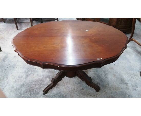 Antique mahogany center table from the mid 19th century France
