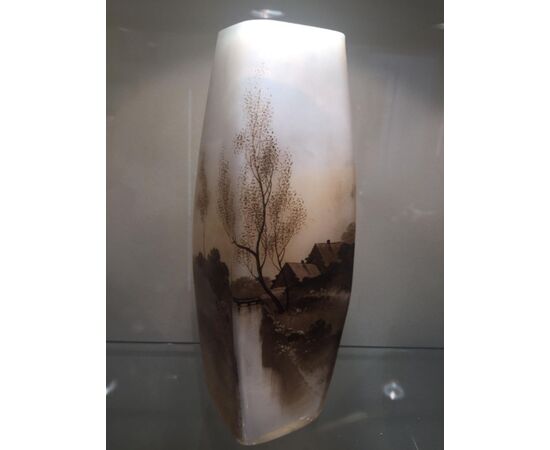 Early 20th century vase painted with river landscape.     