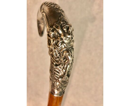 Stick with erotic subject with silver handle with female figure.     