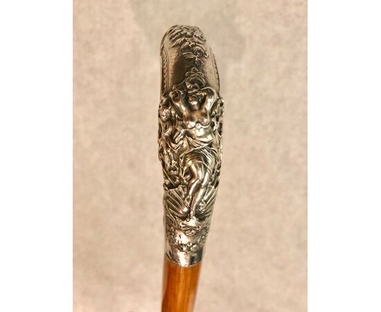 Stick with erotic subject with silver handle with female figure.     