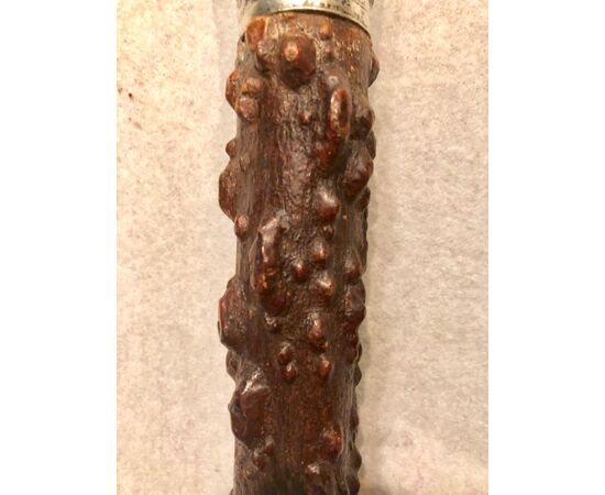 Stick with silver knob engraved with characters. China.     