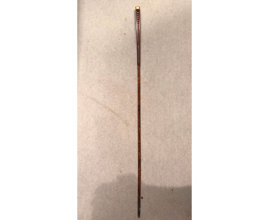 Deco stick with wooden knob containing &quot;agate&quot; hard stone spheres.     