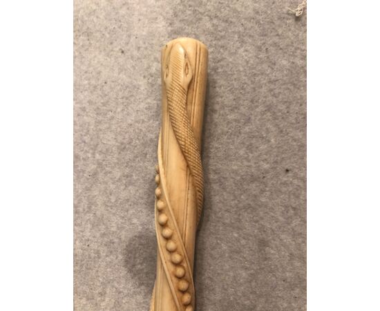 Stick with ivory knob with spiral decoration and twisted snake.     