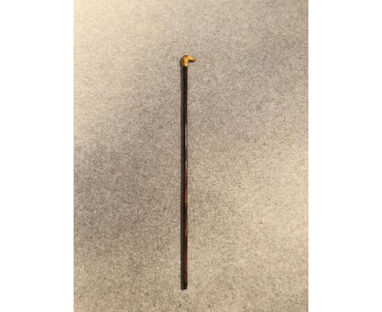 Defense stick with solid bronze pommel depicting a horse&#39;s head.     