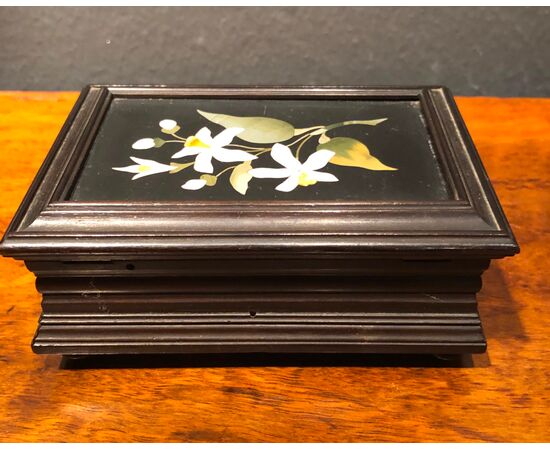 Ebonized wooden box with floral mosaic. Hard stone factory. Florence.     