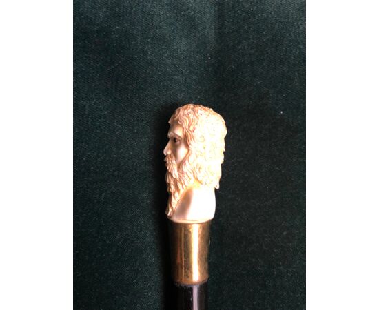 Stick with bone knob depicting male character with beard.Germany.     