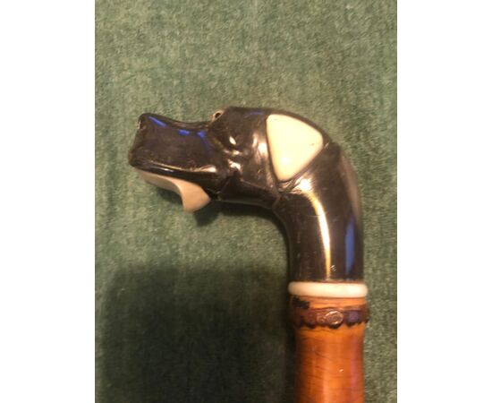 Glove stick with horn knob depicting dog&#39;s head with mechanism to open the mouth. Bamboo barrel.     