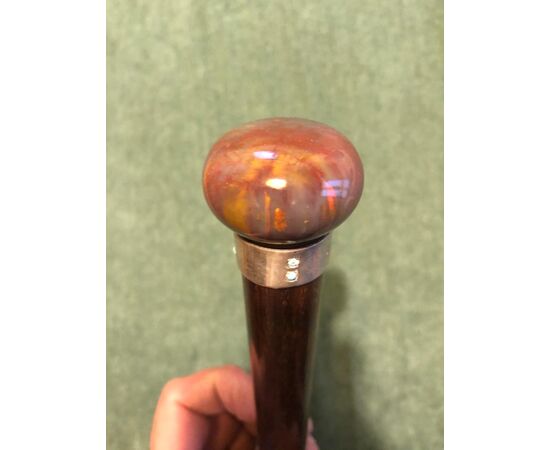 Stick with agate knob and rosewood barrel.     
