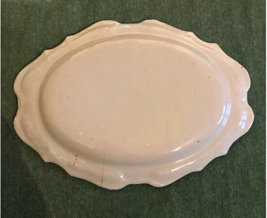 Oval plate decorated in &#39;moustiers&#39; style, San Carlo Manufacture of the Royal Factory of Caserta.     