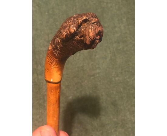 One-piece bamboo stick with knob representing a dog&#39;s head.     
