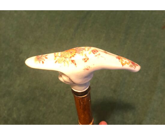 Stick with porcelain handle with male figure with hat Germany.     
