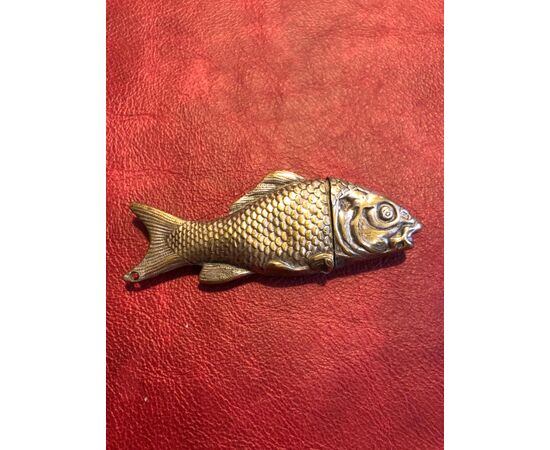 Silver plated brass matchbox in the shape of a fish.     