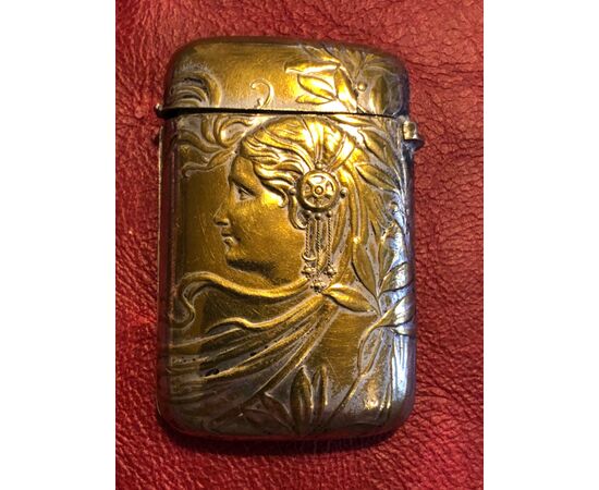 Brass box with female art nouveau profile.     