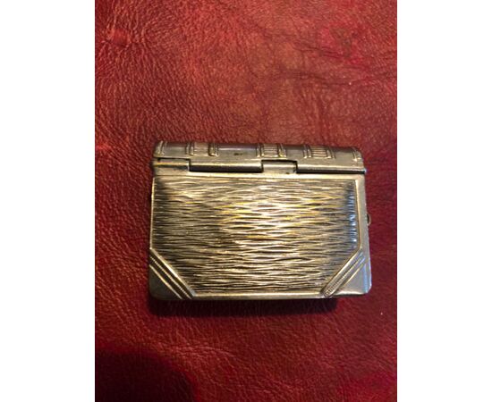 Silver plated brass matchbox and coin holder in the shape of an album.     
