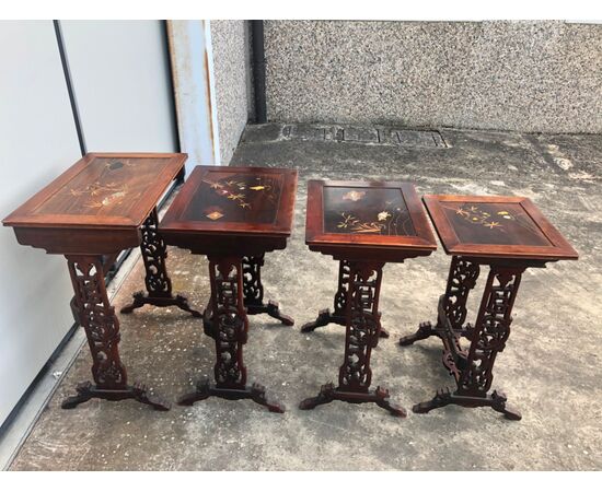 Coffee table made up of 4 mahogany side tables, one inside the other with inlaid tops. China     