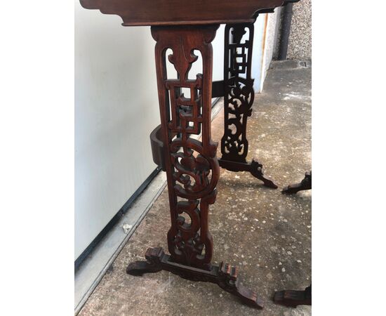 Coffee table made up of 4 mahogany side tables, one inside the other with inlaid tops. China     