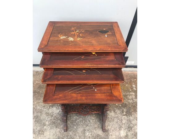 Coffee table made up of 4 mahogany side tables, one inside the other with inlaid tops. China     