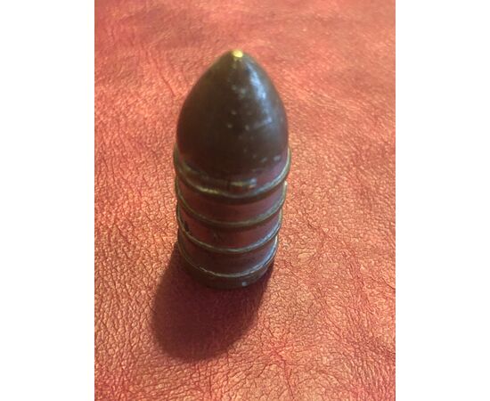 Bronze matchbox in the shape of an ogive.     
