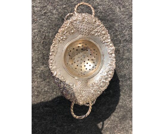 Double colander in silver with two handles with floral decorations.Italy.     