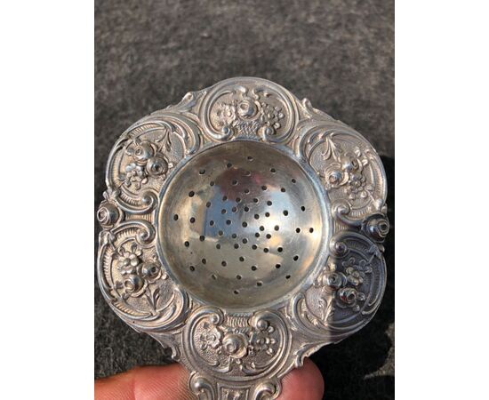 Silver colander with rocaille decoration and stylized plant motifs. Germany.     