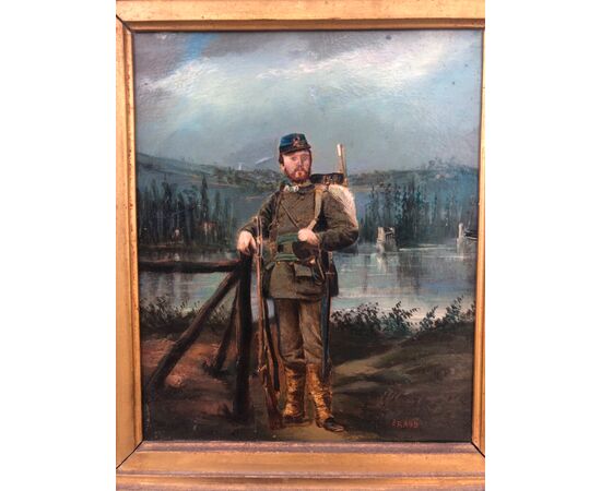 Dipinto olio su cartoncino con figura di soldato su sfondo agreste.Firma:Eraud
