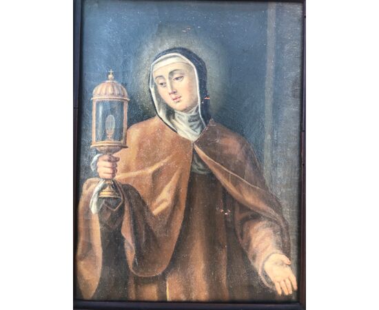 Oil painting on canvas depicting Santa Chiara.     