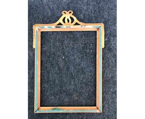 Carved and gilded wooden frame with geometric motifs and upper knot. Napoleon III period.     