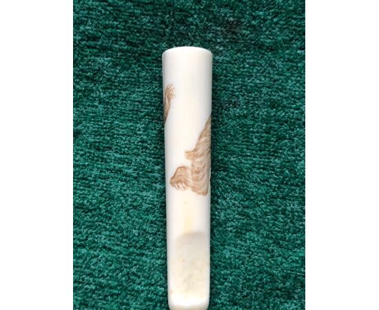 Small ivory mouthpiece engraved with a monkey figure. Japan.     