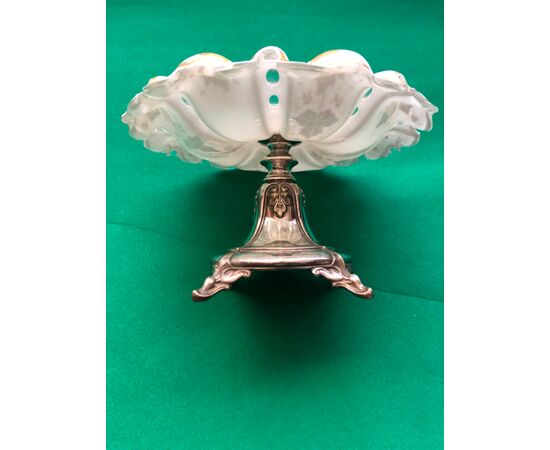 Silver tripod centerpiece stand with layered and ground crystal cup with gold vine branch decorations.     