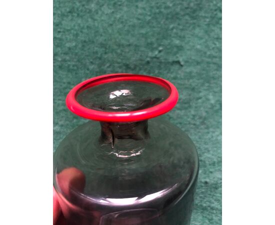 Small bottle-jar in blown glass signed Venini.     