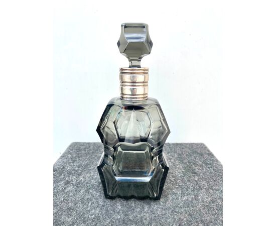 Art Deco style faceted crystal bottle with silver neck Sterling punch (925 sterling silver) USA.     