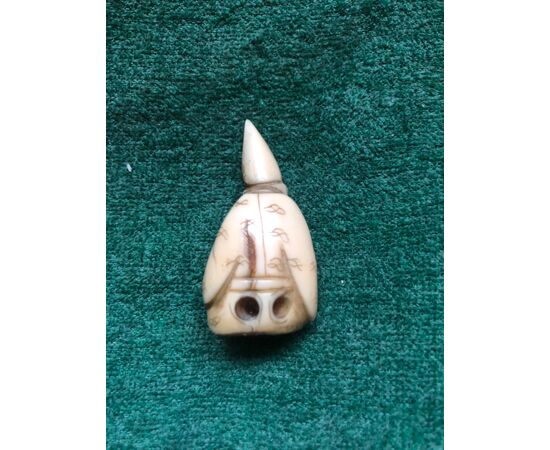 Ivory netsuke &#39;with seated figure with hat. Japan     