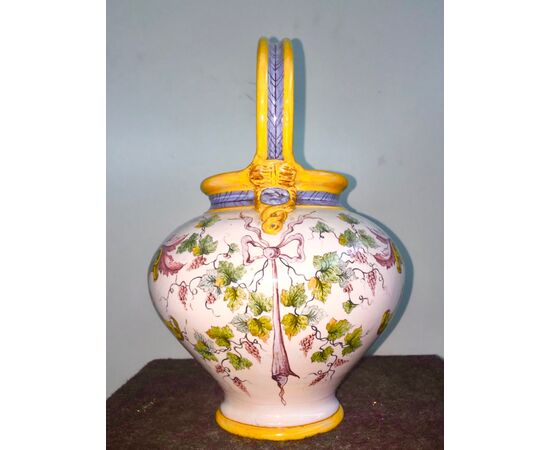 Majolica pourer with mascaron handle decorated with plant motifs and festoons. Medici noble coat of arms. Ginori.     