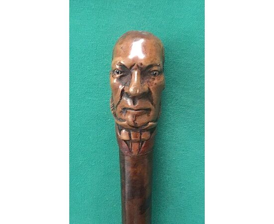 Walking stick with boxwood knob depicting a male head, fruit tree wood cane.     