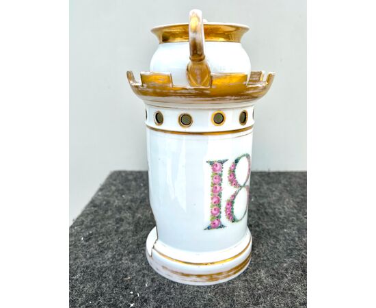 Veilleuse-tisaniera in porcelain with turret motifs and date 1827 with floral decoration.Gold lightings.France     