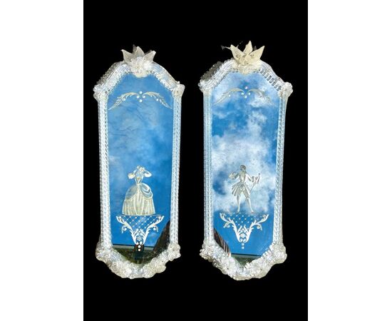 Pair of mirrors in glass with mirror engraved with male and female characters.Murano.     
