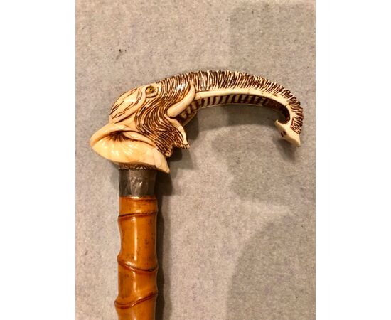 Hippopotamus stick with ivory knob depicting large elephant head and bamboo cane.     