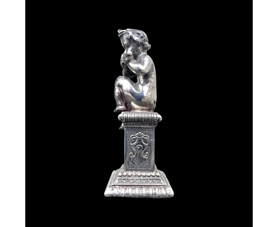 Small solid silver sculpture depicting a musician child Italy.     