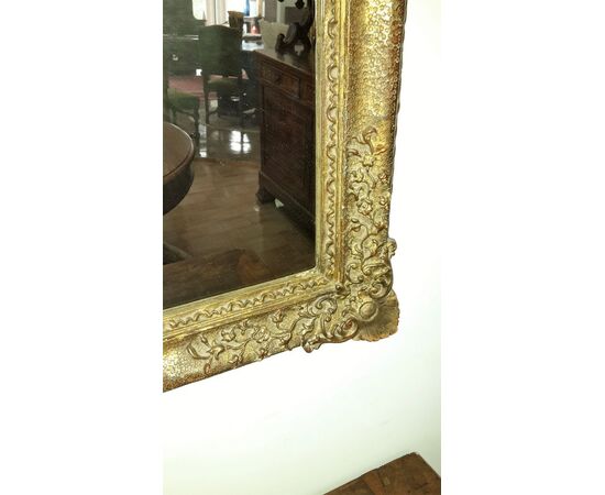 Mirror in wood and gilded plaster