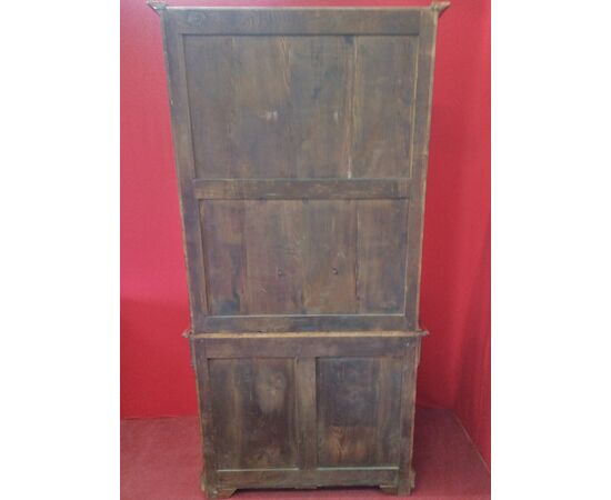 Small two-door bookcase in mahogany