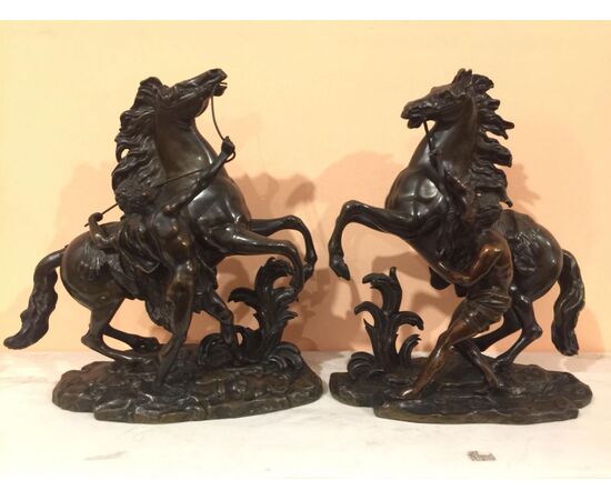 Pair of bronze sculptures depicting "Les Chevaux de Marly"