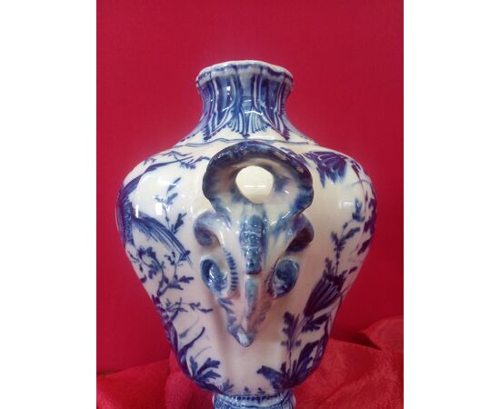 Vase with ceramic cap decorated in blue