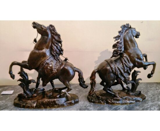 Pair of bronze sculptures depicting "Les Chevaux de Marly"