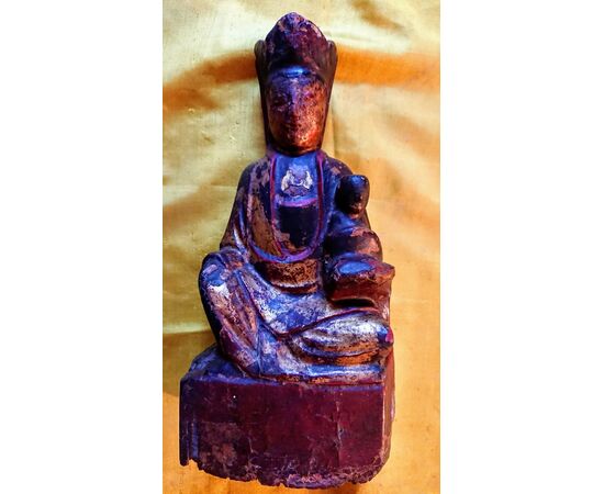 Polycoroma wooden statuette representing Guanyin, protector of births