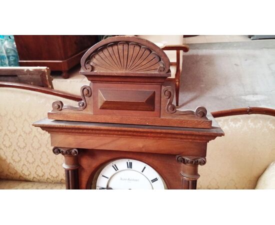 Pendulum clock in mahogany wood signed, from Vienna, first half of the 19th century