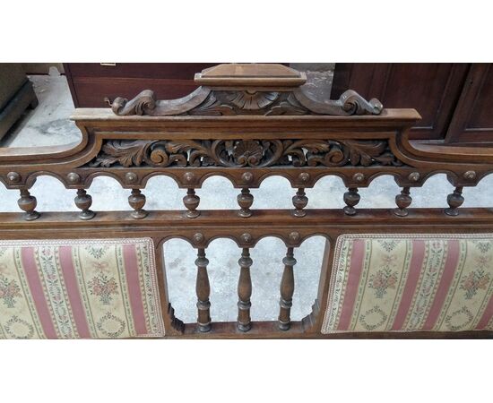 Details on Mahogany sofa with English Victorian sculpture works
