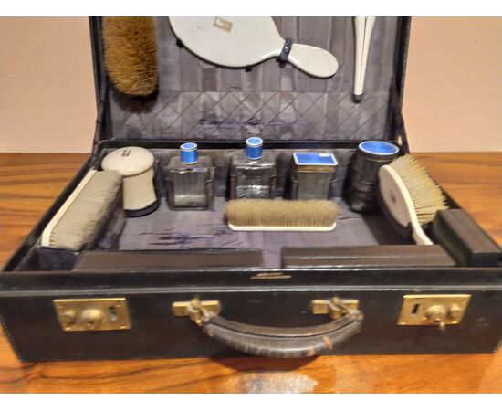 Travel set with leather case signed Alexandrine, Champs-Elisées France