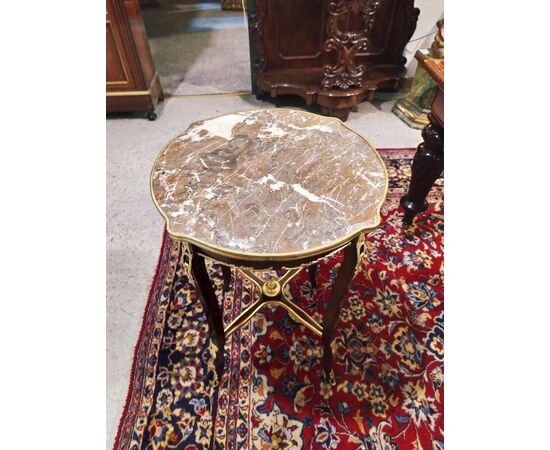 Mahogany coffee table with gilt bronze applications and marble top