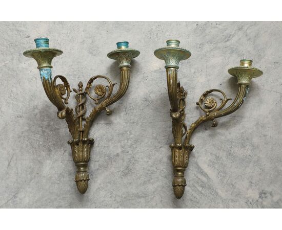 Pair of appliques in gilded bronze with two lights