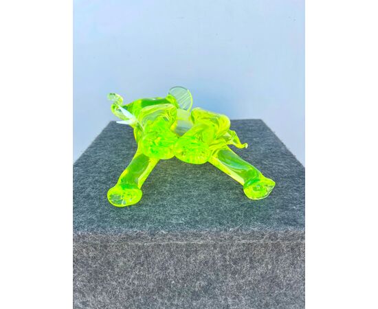 Elephant in heavy yellow &#39;uranium&#39; glass with red eyes and milky tusks.Seguso manufacture, Murano.     